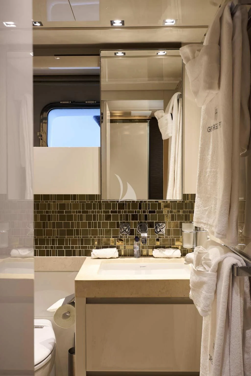 a bathroom with a sink and mirror aboard DE ZEUS Yacht for Sale
