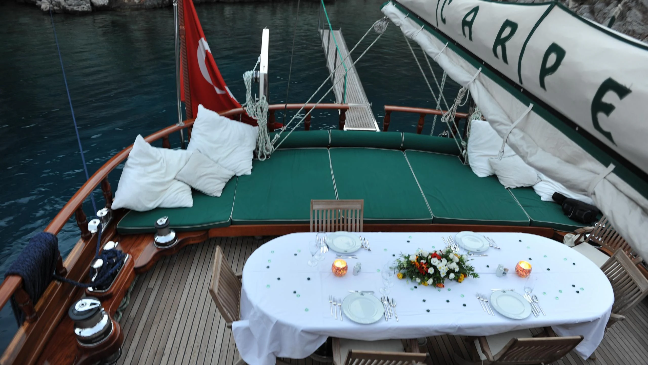 a boat with flowers on the front aboard CARPE DIEM 1 Yacht for Sale