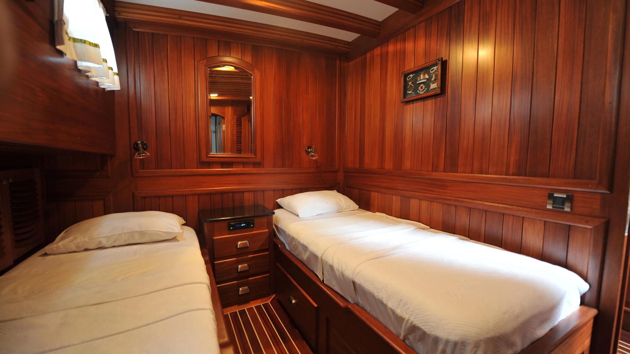 a room with wooden walls aboard CARPE DIEM 1 Yacht for Sale