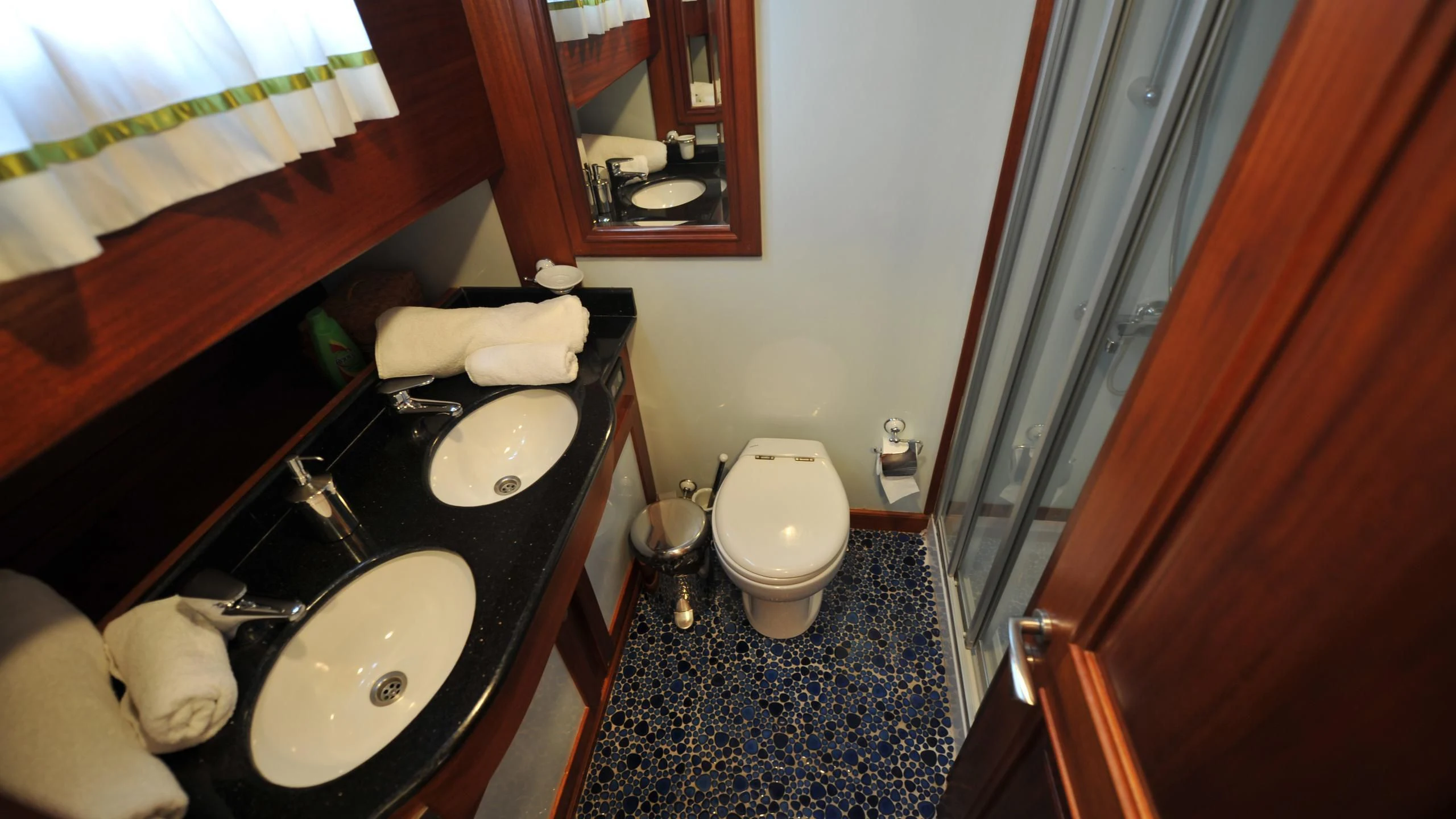 a bathroom with a sink and a toilet aboard CARPE DIEM 1 Yacht for Sale