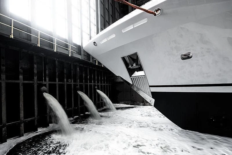a black and white photo of a submarine in the water aboard NENINKA Yacht for Sale
