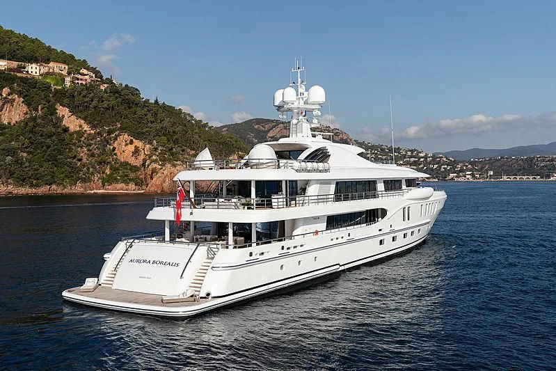 a white boat on water aboard NENINKA Yacht for Sale