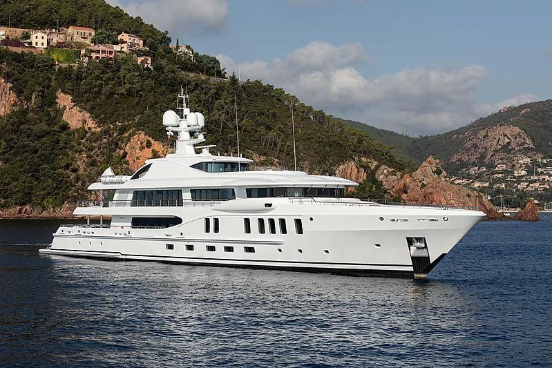 a white boat on water aboard NENINKA Yacht for Sale