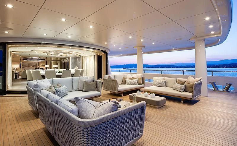 a living room with a large pool aboard NENINKA Yacht for Sale
