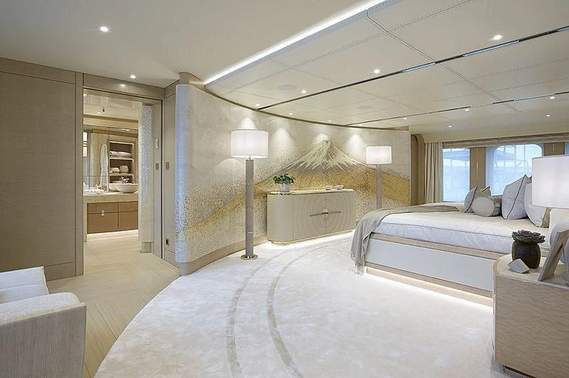 a large bedroom with a large bed aboard NENINKA Yacht for Sale