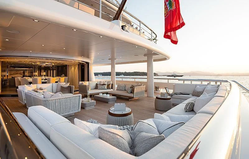 a large living room with a large balcony aboard NENINKA Yacht for Sale
