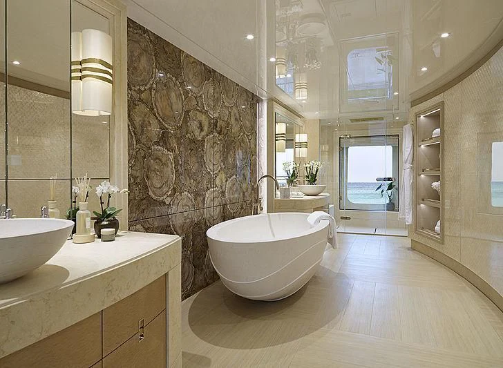 a bathroom with a large marble wall aboard NENINKA Yacht for Sale