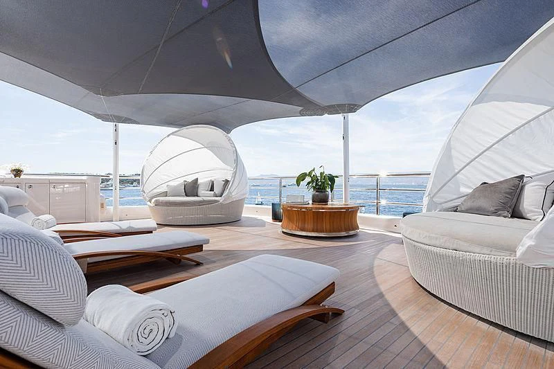 a room with a large bed and a large white dome on the wall aboard NENINKA Yacht for Sale
