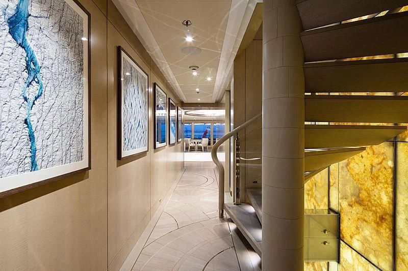a hallway with a painting on the wall aboard NENINKA Yacht for Sale