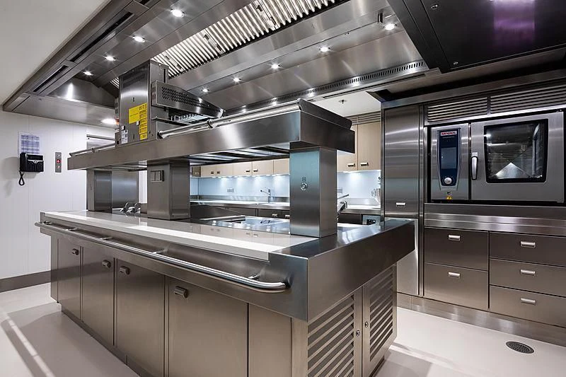 a kitchen with stainless steel appliances aboard NENINKA Yacht for Sale