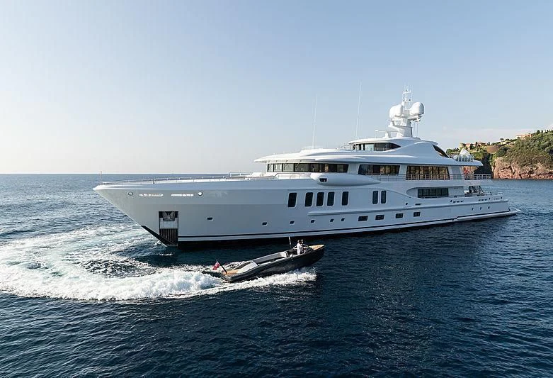 a large white boat on the water aboard NENINKA Yacht for Sale