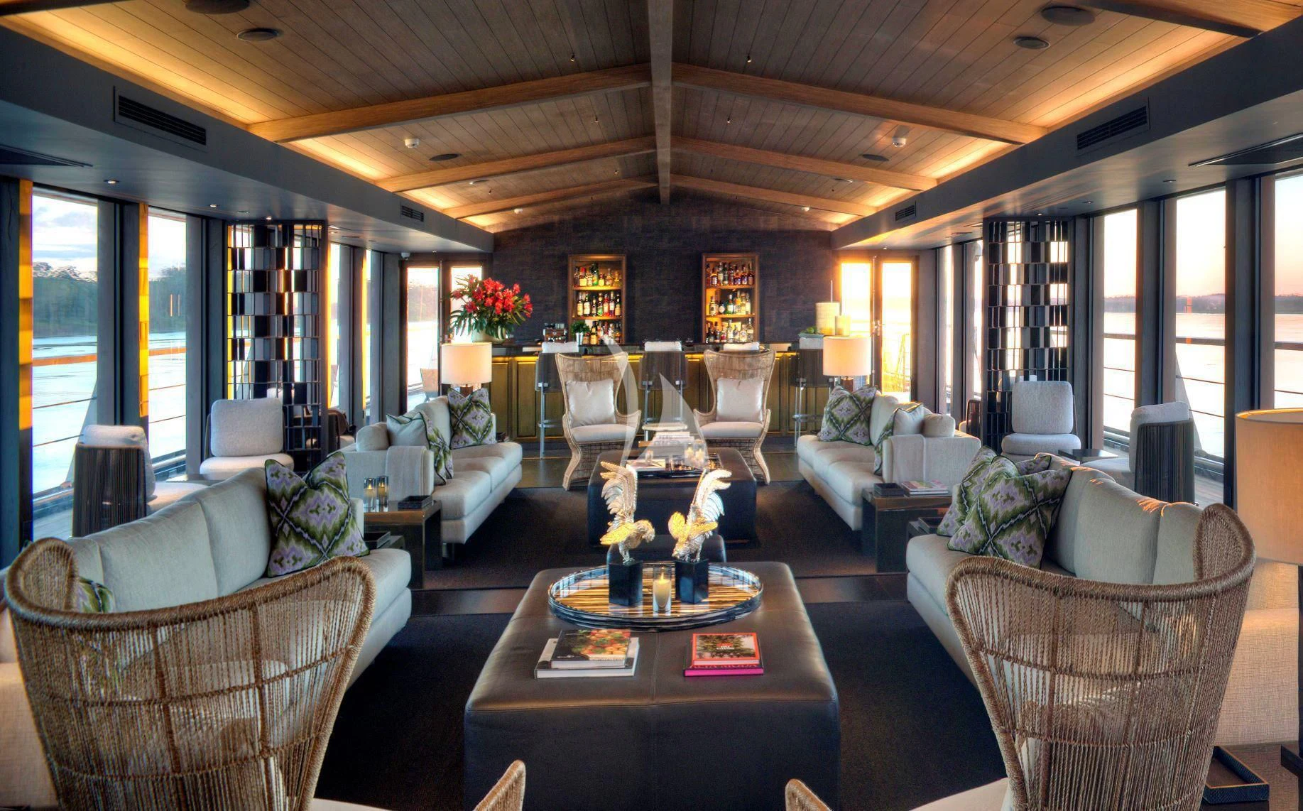 a living room with a large window aboard AQUA NERA Yacht for Sale