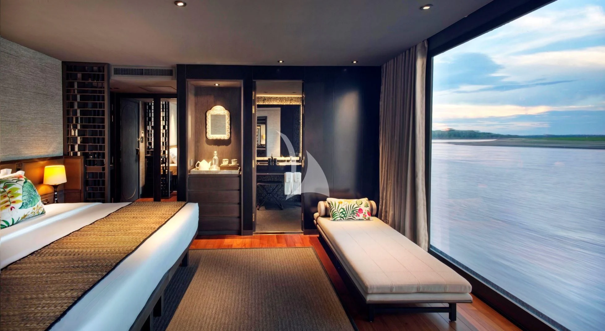 a hotel room with a large window aboard AQUA NERA Yacht for Sale