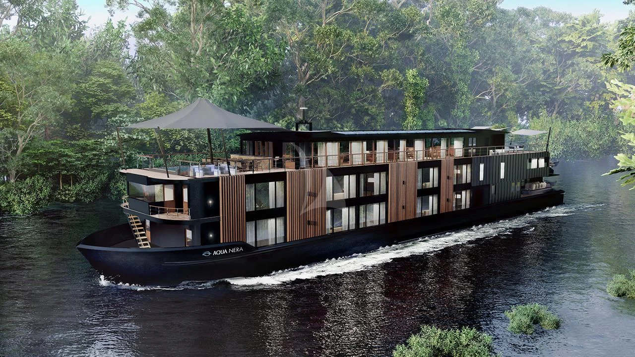a boat on a river aboard AQUA NERA Yacht for Sale