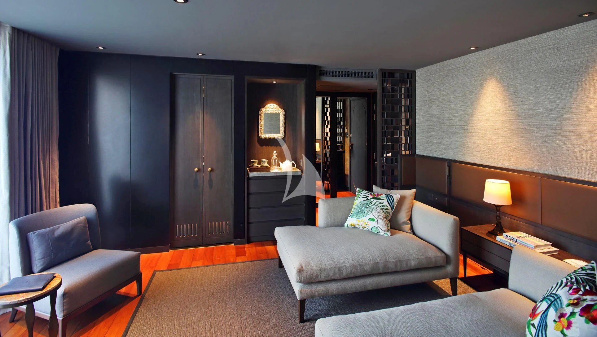 a room with a couch and a table aboard AQUA NERA Yacht for Sale