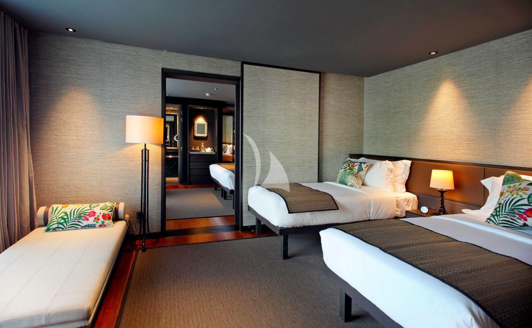 a hotel room with a bed and a chair aboard AQUA NERA Yacht for Sale