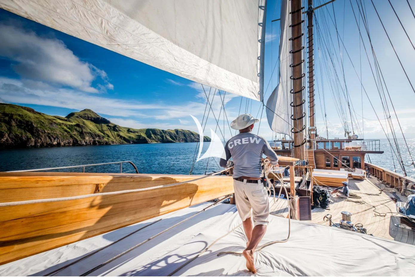 a person standing on a boat aboard LAMIMA Yacht for Sale