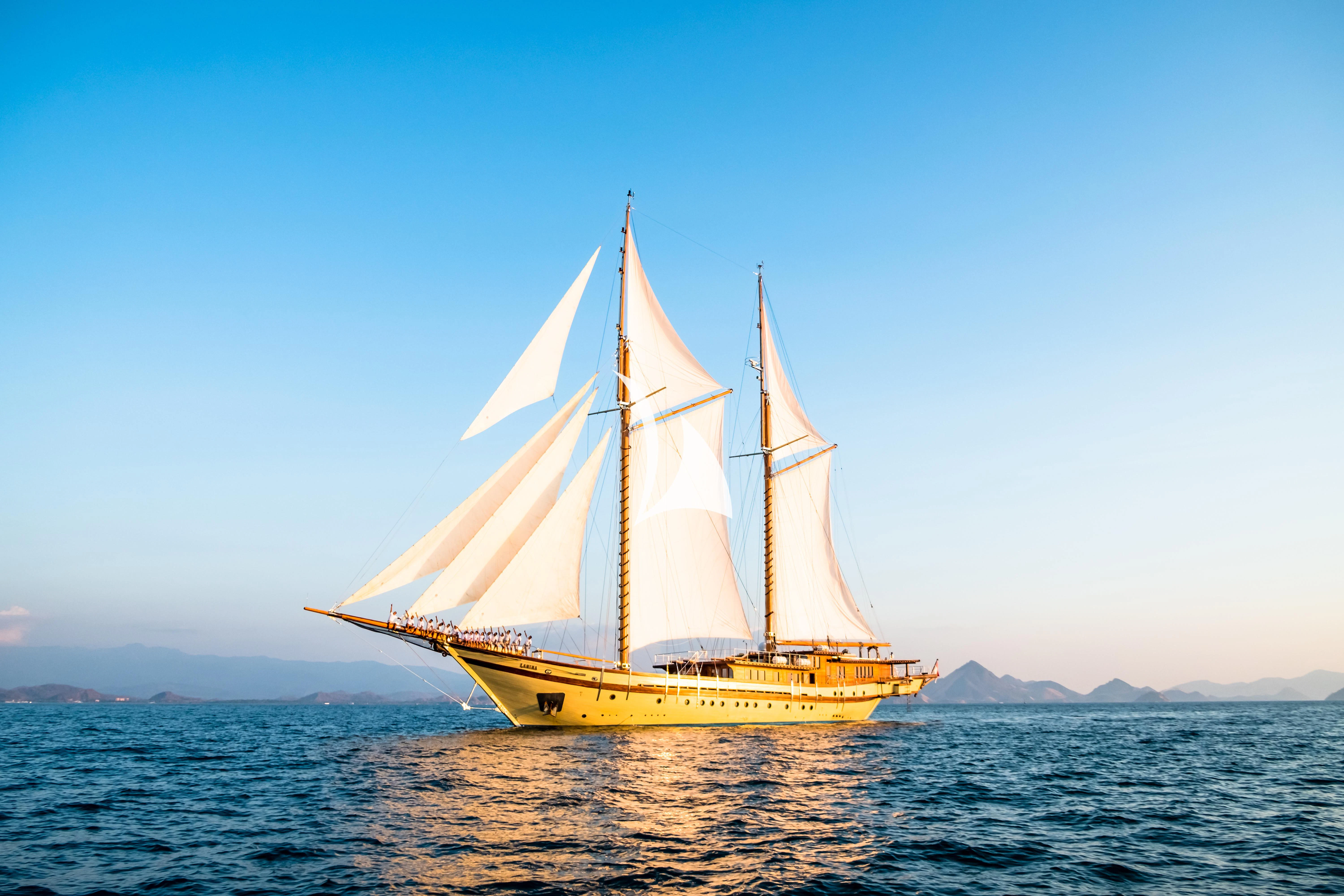 a sailboat on the water aboard LAMIMA Yacht for Sale