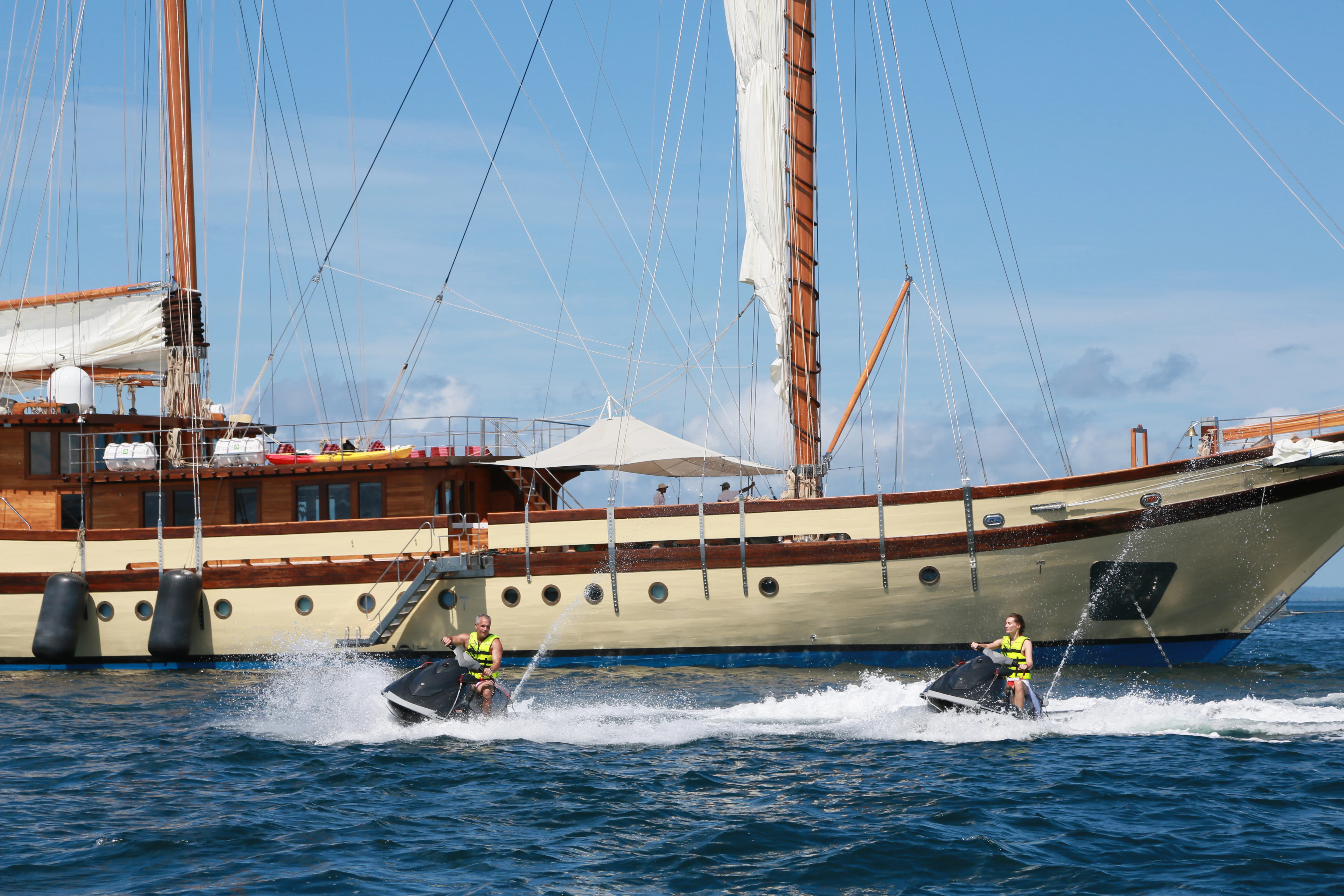 a couple of people on a boat aboard LAMIMA Yacht for Sale