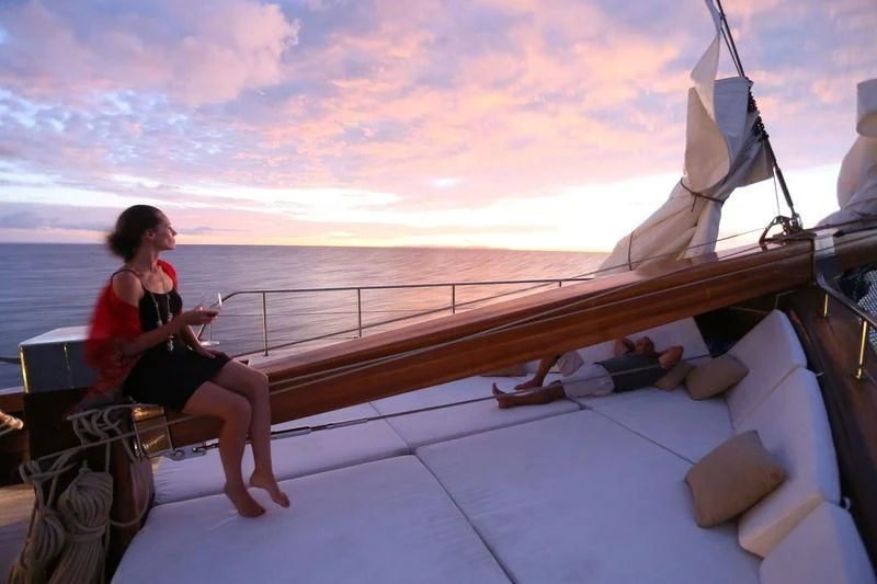 a person sitting on a boat aboard LAMIMA Yacht for Sale