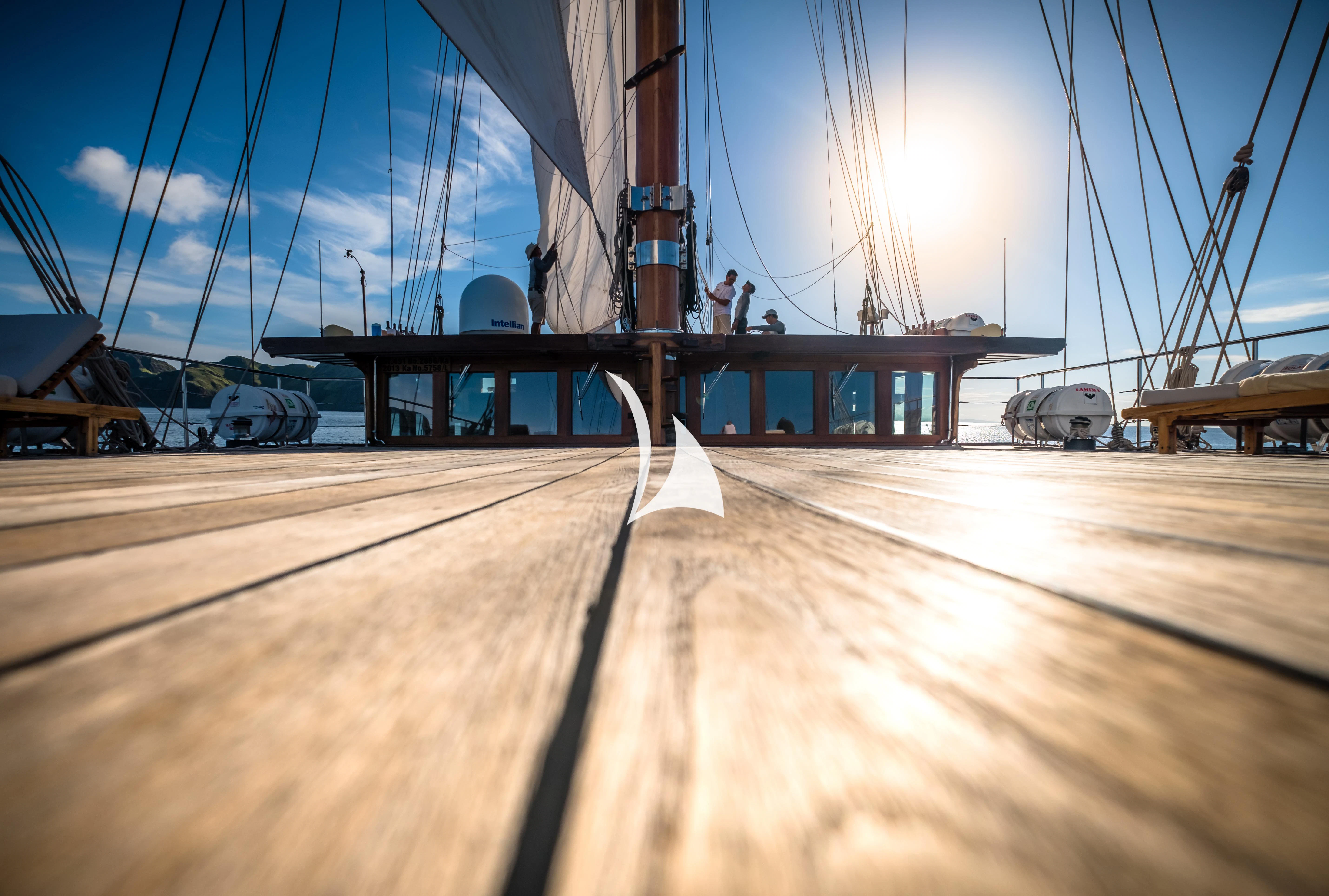 a large ship docked aboard LAMIMA Yacht for Sale