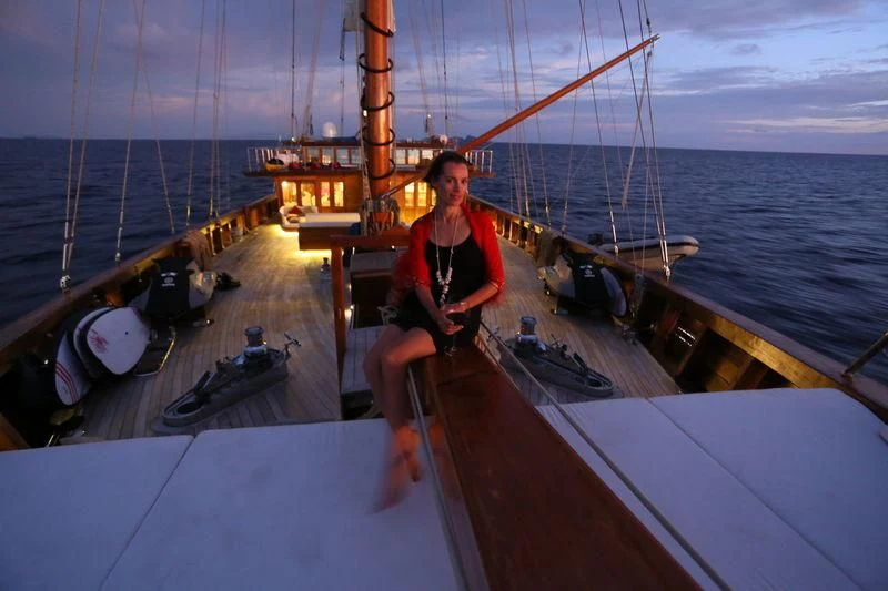 a person sitting on a boat aboard LAMIMA Yacht for Sale