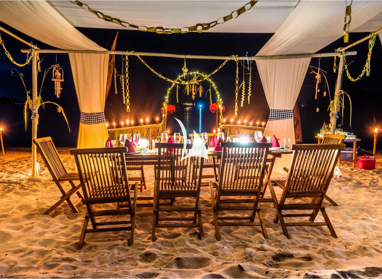a group of chairs outside aboard LAMIMA Yacht for Sale
