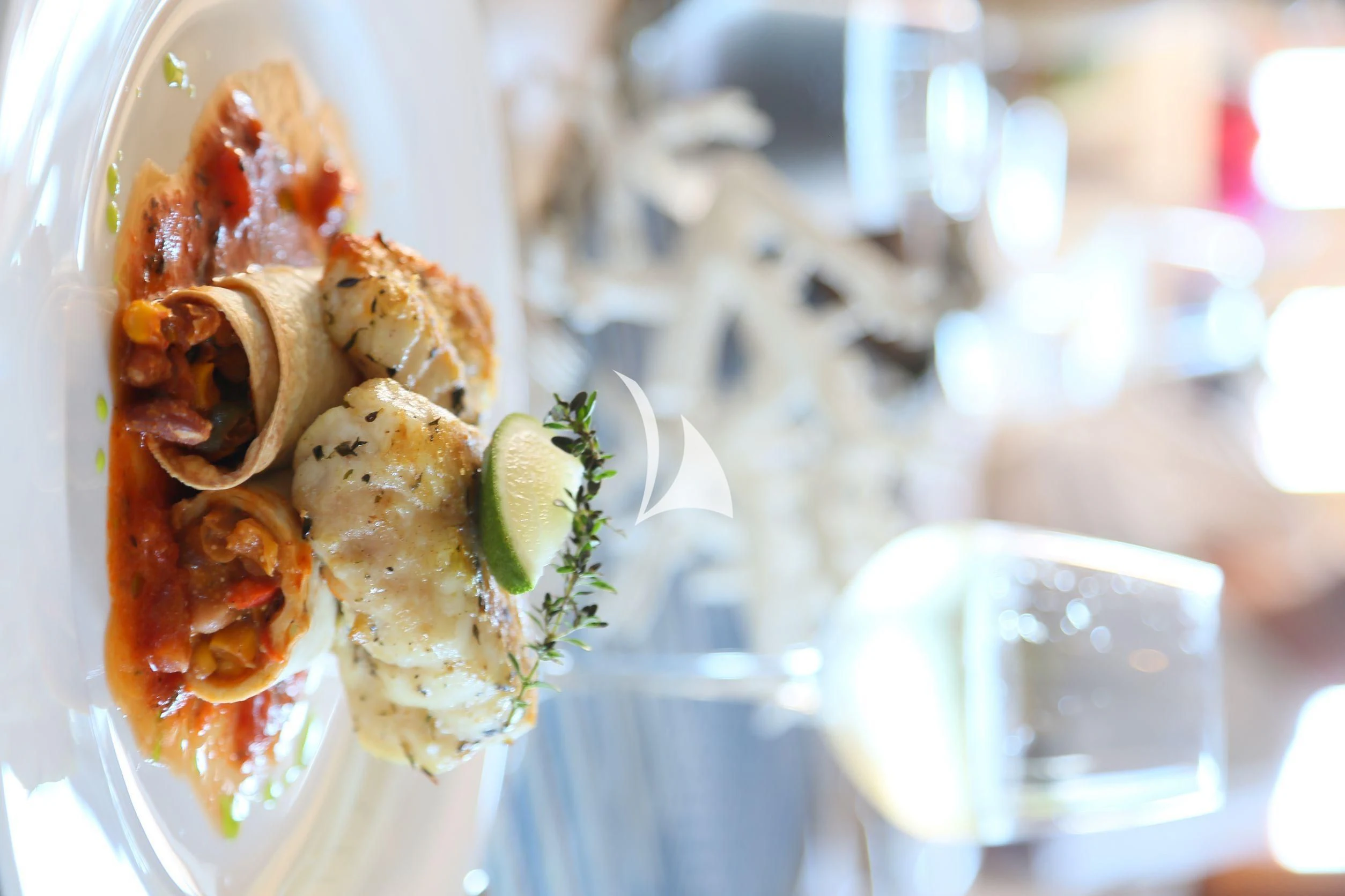 a plate of food aboard LAMIMA Yacht for Sale