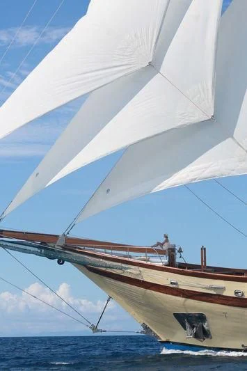 a sailboat on the water aboard LAMIMA Yacht for Sale
