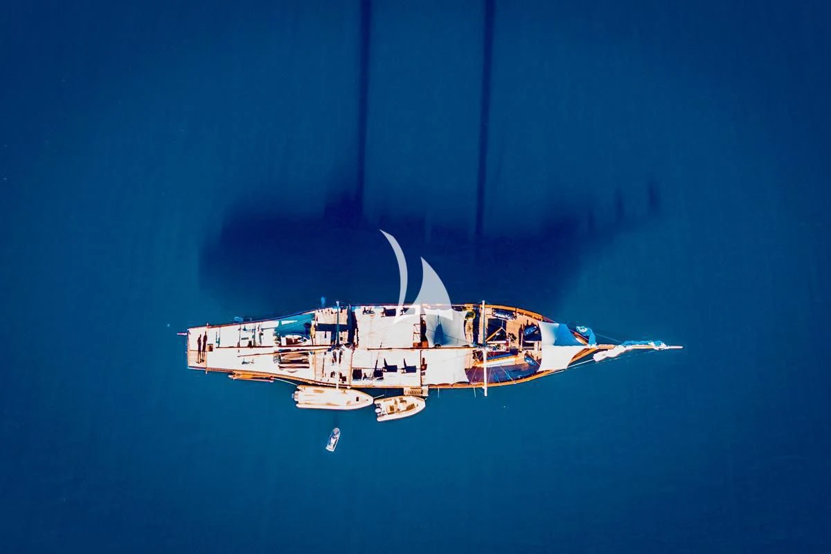 a helicopter flying in the sky aboard LAMIMA Yacht for Sale