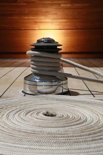 stacks of coins on a table aboard LAMIMA Yacht for Sale
