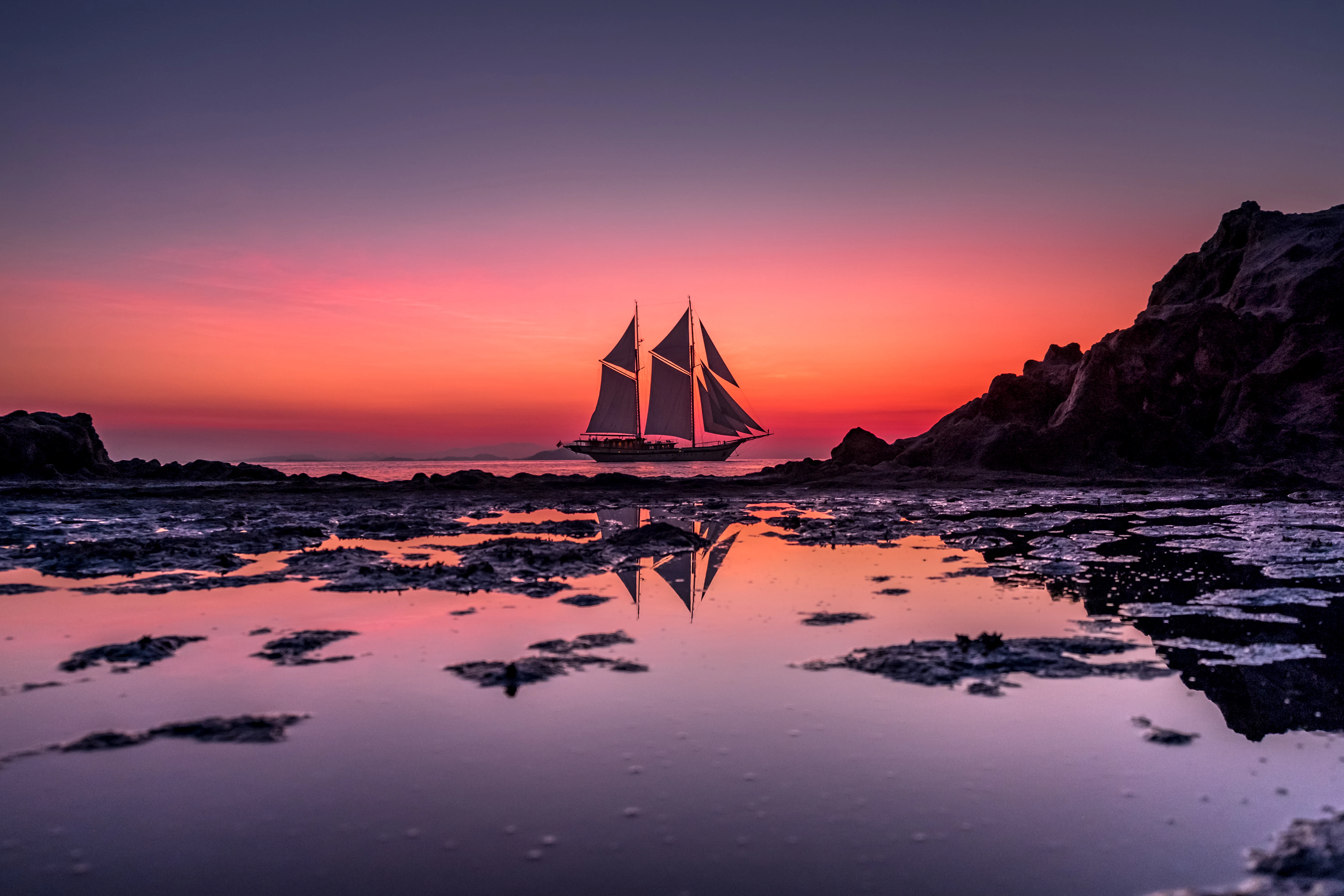 a sailboat on the water aboard LAMIMA Yacht for Sale