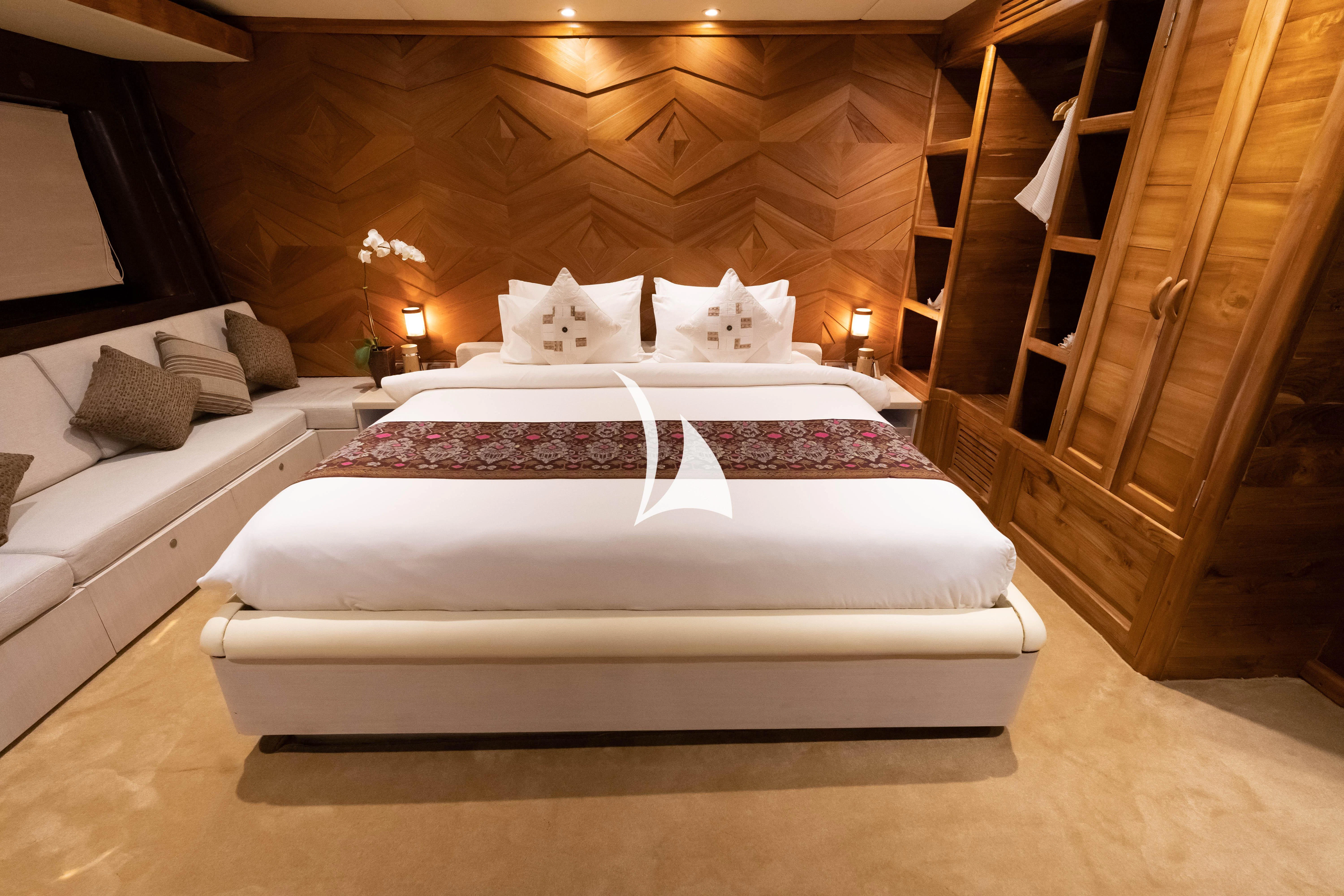a bed in a cabin aboard LAMIMA Yacht for Sale