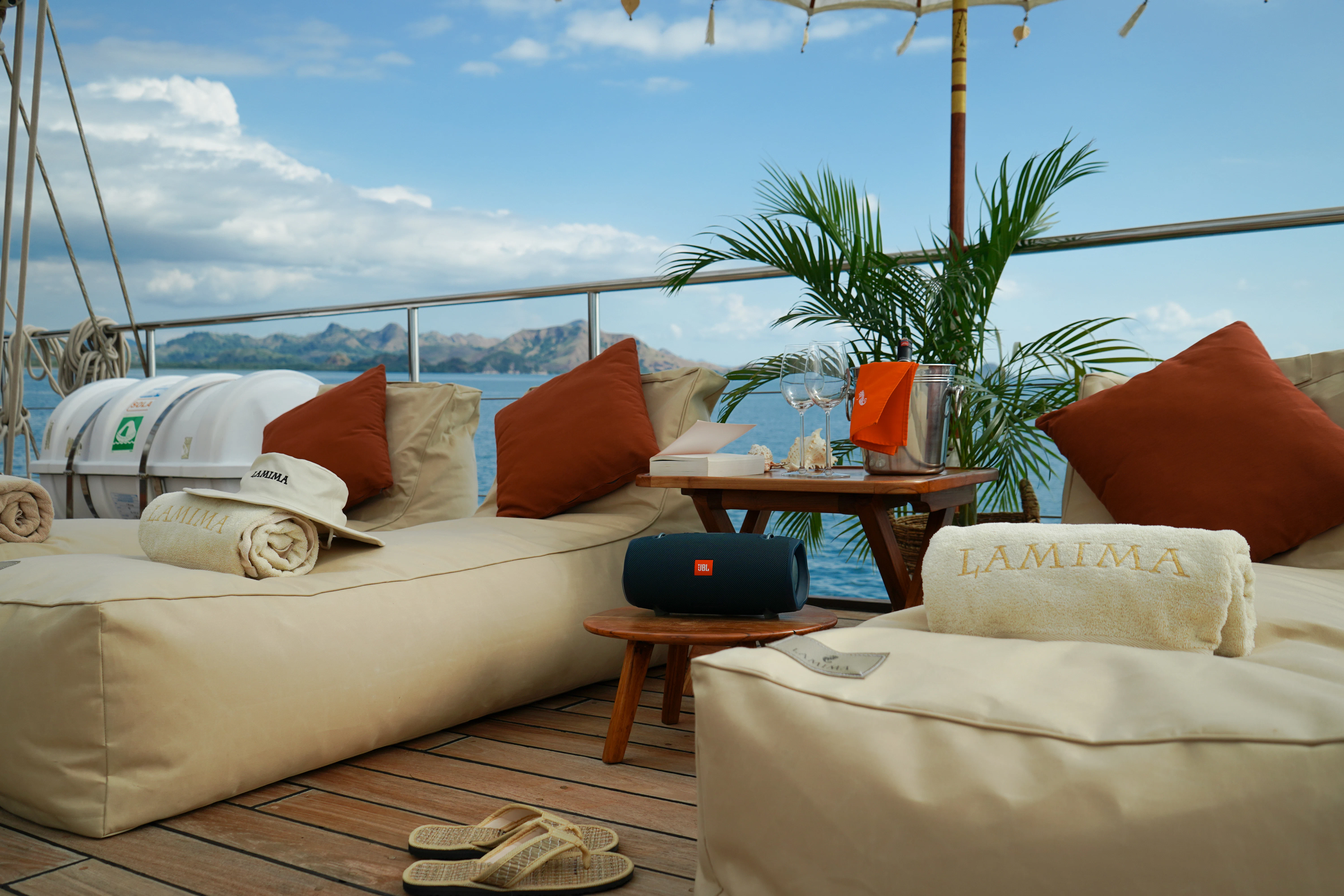 a room with a bed and a laptop on the table aboard LAMIMA Yacht for Sale