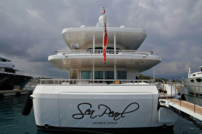 a large white ship docked aboard ALFA G Yacht for Sale