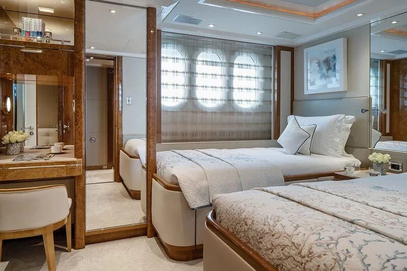 a room with two beds aboard ALFA G Yacht for Sale