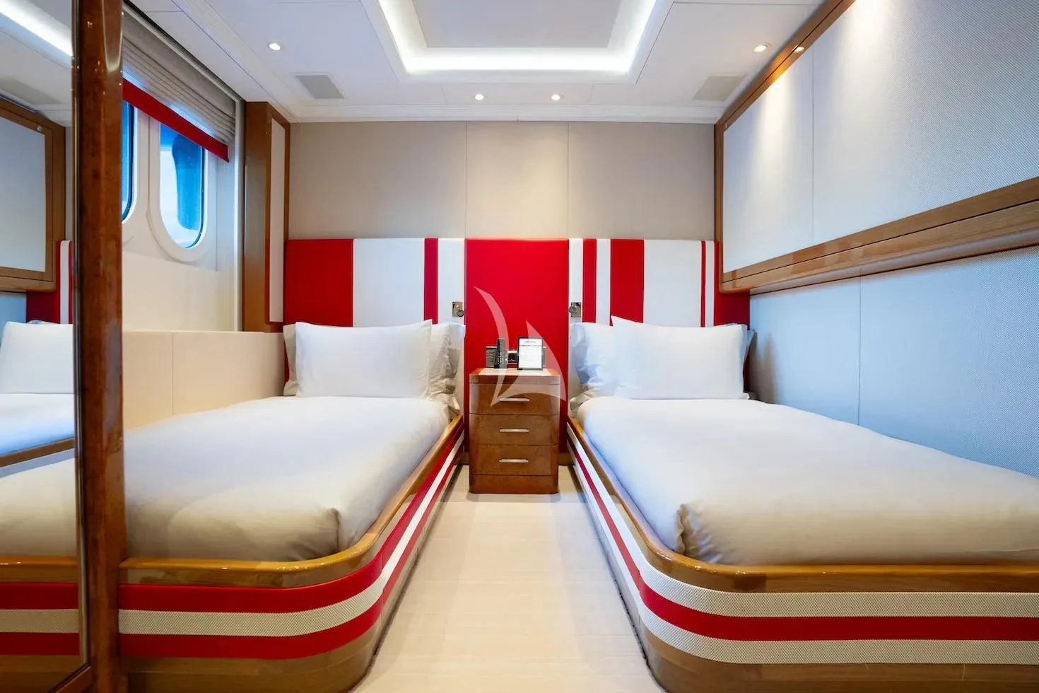 a room with a couple of beds aboard ALFA G Yacht for Sale