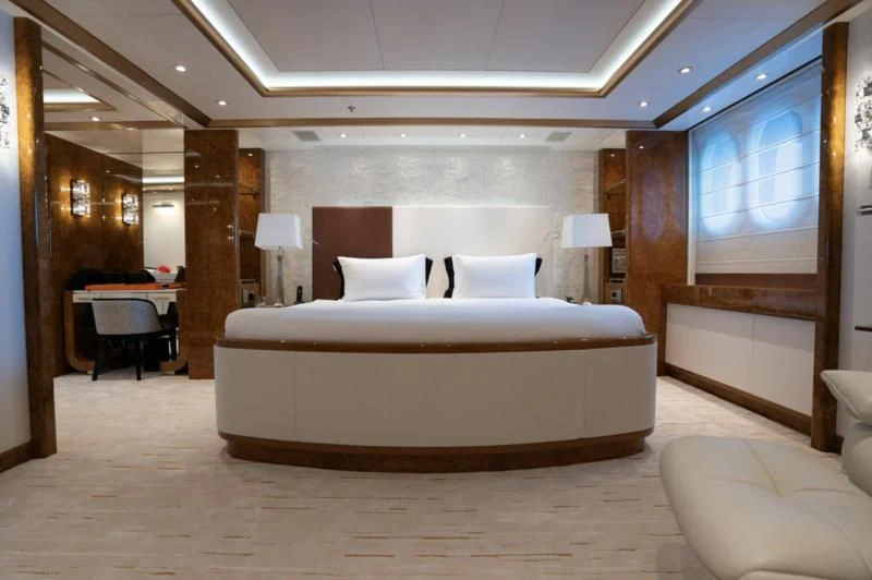 a large bed in a hotel room aboard ALFA G Yacht for Sale