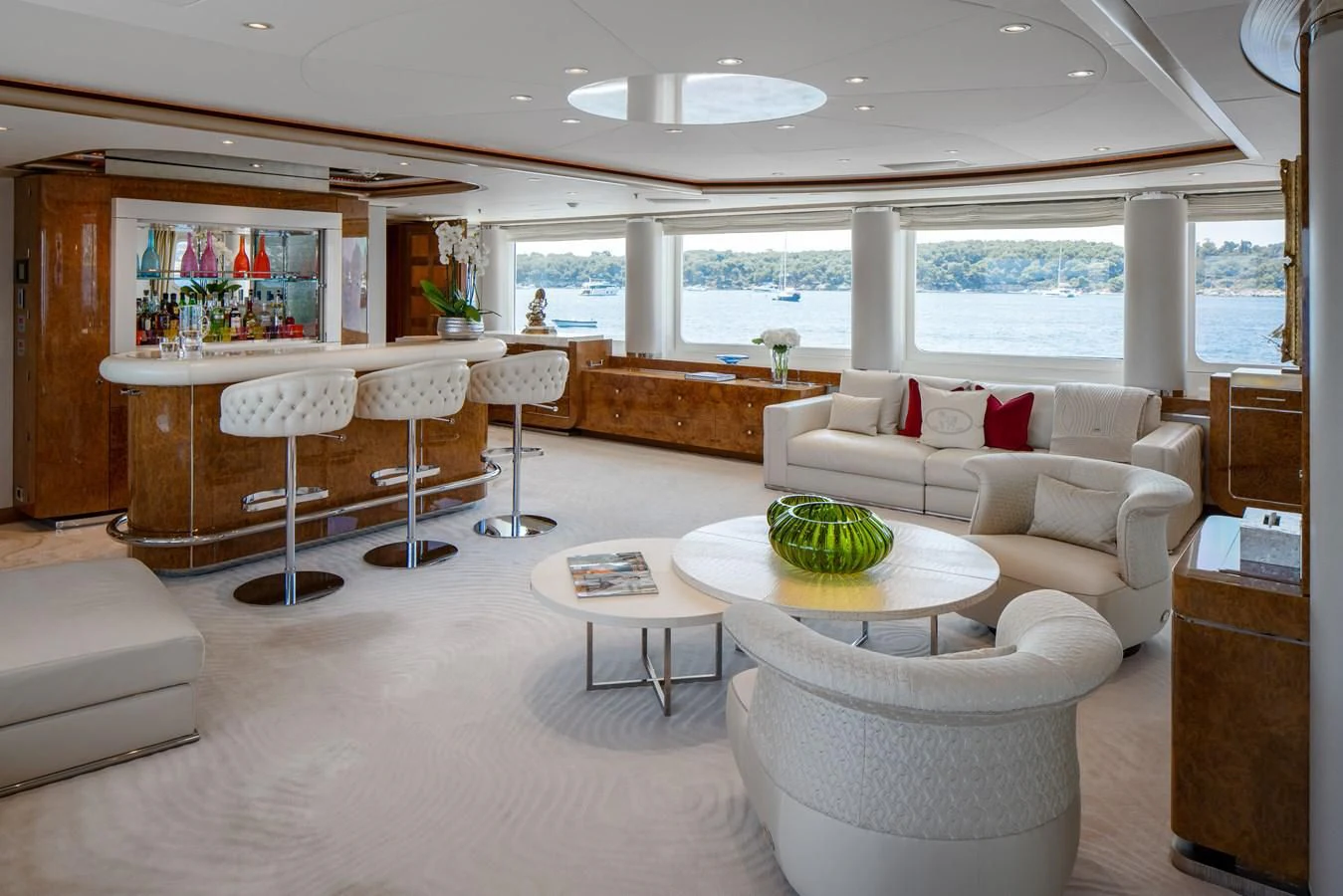a living room with a large window aboard ALFA G Yacht for Sale