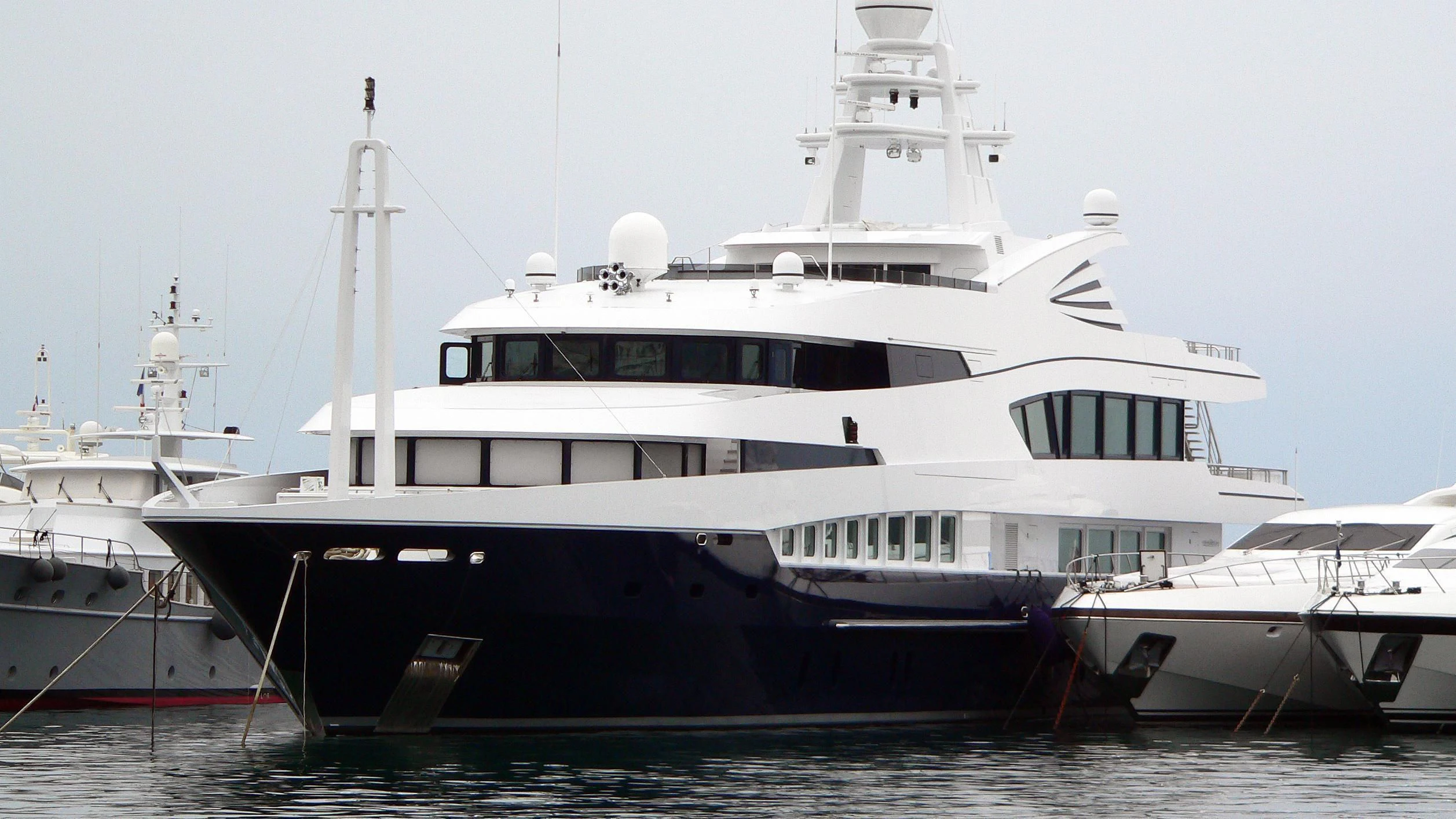 a couple of large boats in the water aboard ALFA G Yacht for Sale