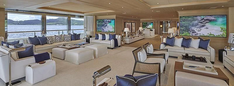 a living room with a large window aboard IJE Yacht for Sale