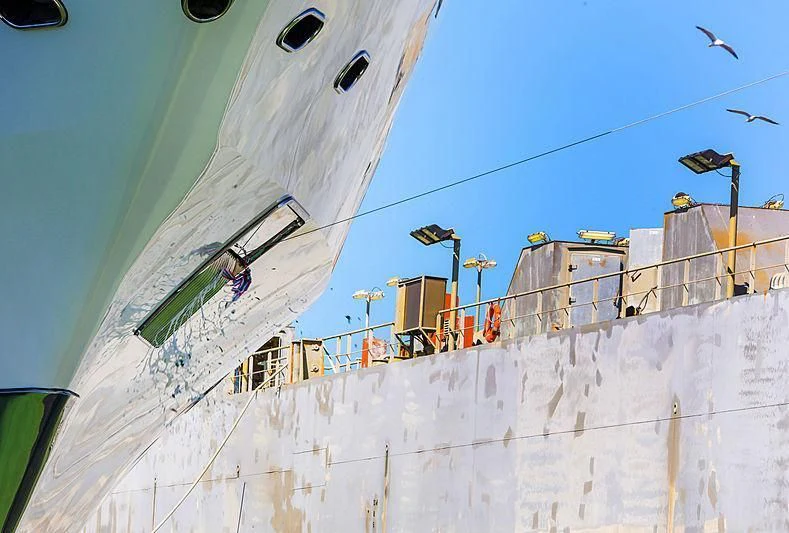a boat with a person on it aboard IJE Yacht for Sale
