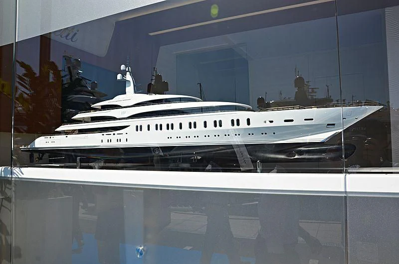a white yacht in a building aboard IJE Yacht for Sale