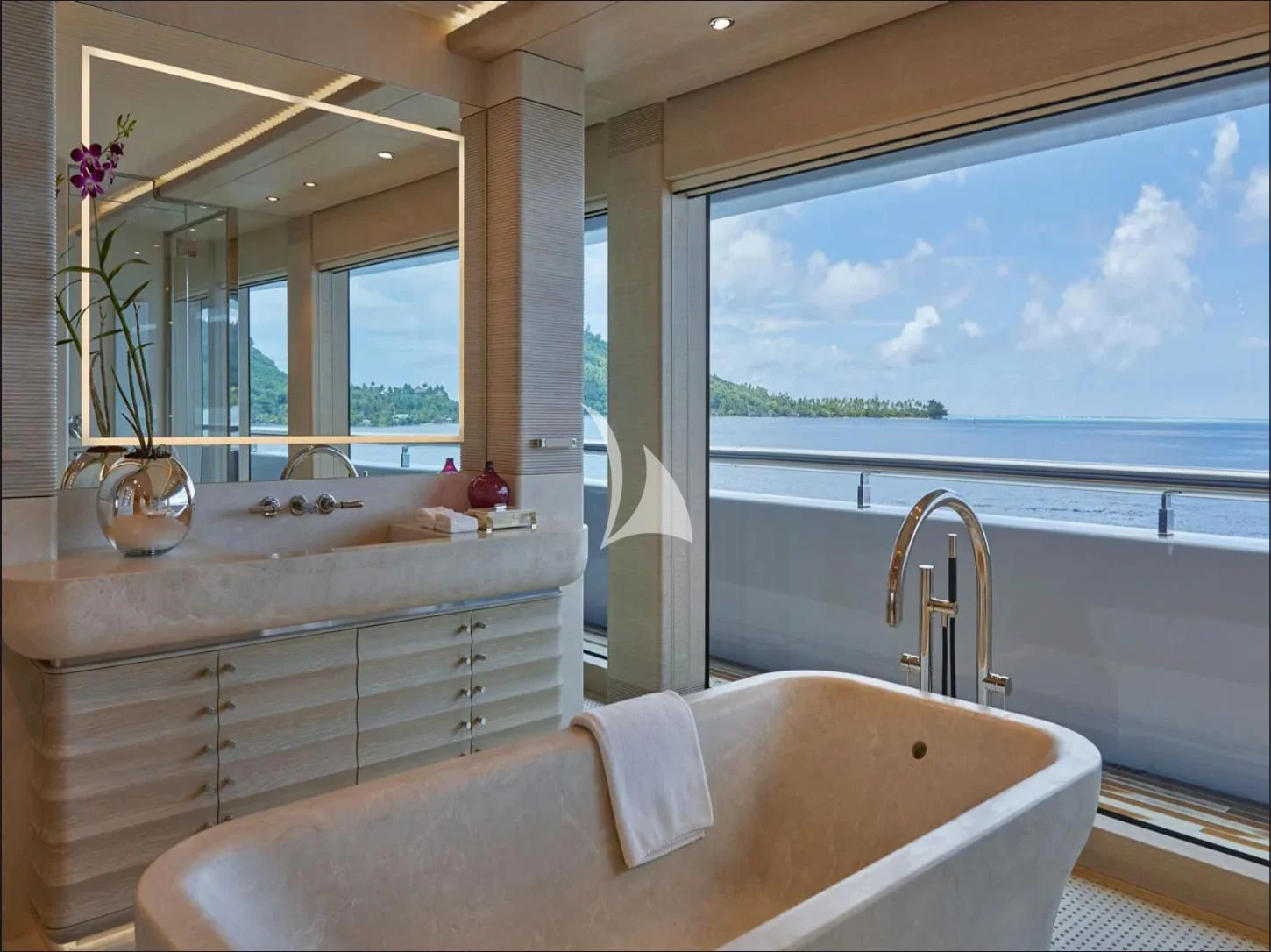 a bathroom with a large window aboard IJE Yacht for Sale