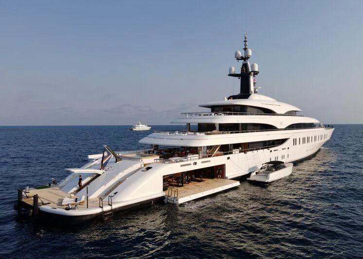 a large white yacht in the water aboard IJE Yacht for Sale