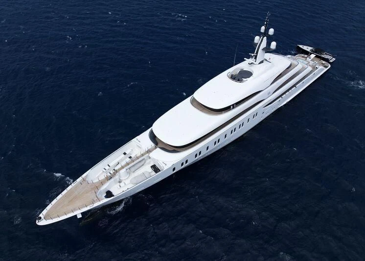 a white boat in the water aboard IJE Yacht for Sale