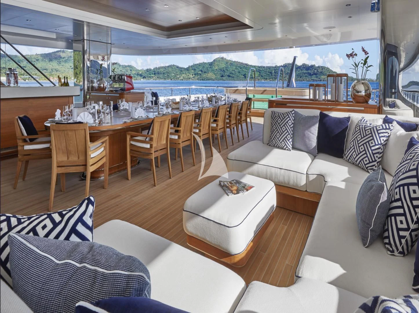 a living room with a large window aboard IJE Yacht for Sale