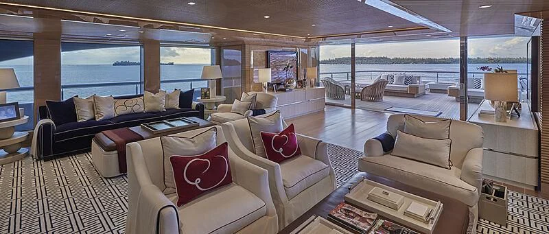 a living room with a large window aboard IJE Yacht for Sale