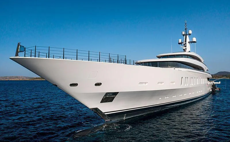 a white yacht on the water aboard IJE Yacht for Sale