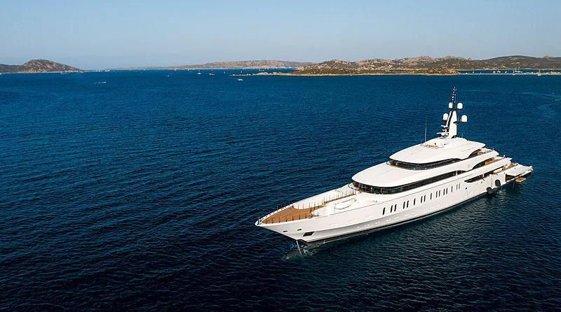 a white boat in the water aboard IJE Yacht for Sale